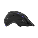Giro Verce MIPS Women's Mountain Bike Helmet in a trail setting Matte Black Electric Purple right