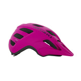 Giro Verce MIPS Women's Mountain Bike Helmet in a trail setting Pink Street Right