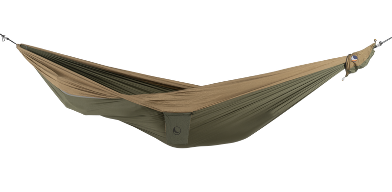 Ticket to the Moon Original Outdoor Hammock set up between trees in a park.