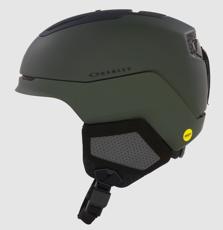 Oakley MOD5 Mips Unisex Snow Ski Winter Helmet in action on a snowy mountain Olive Green
