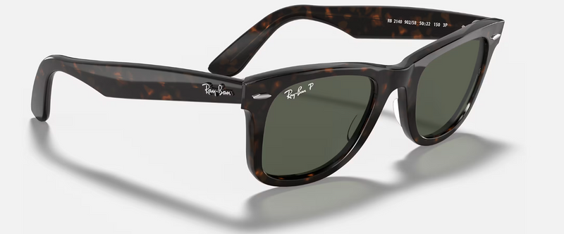 Ray-Ban Wayfarer Classic sunglasses in various colors with polarized and gradient lenses, featuring acetate frames and iconic logo.